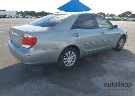 2005 Toyota Camry Le z USA, uszkodzony, nr VIN 4T1BE32K45U632473
